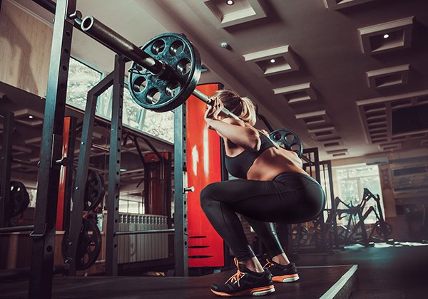 tap wide stance barbell squat